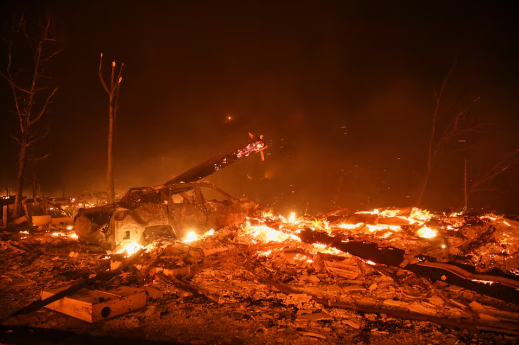 Wildfires rage in Los Angeles, forcing tens of thousands to flee