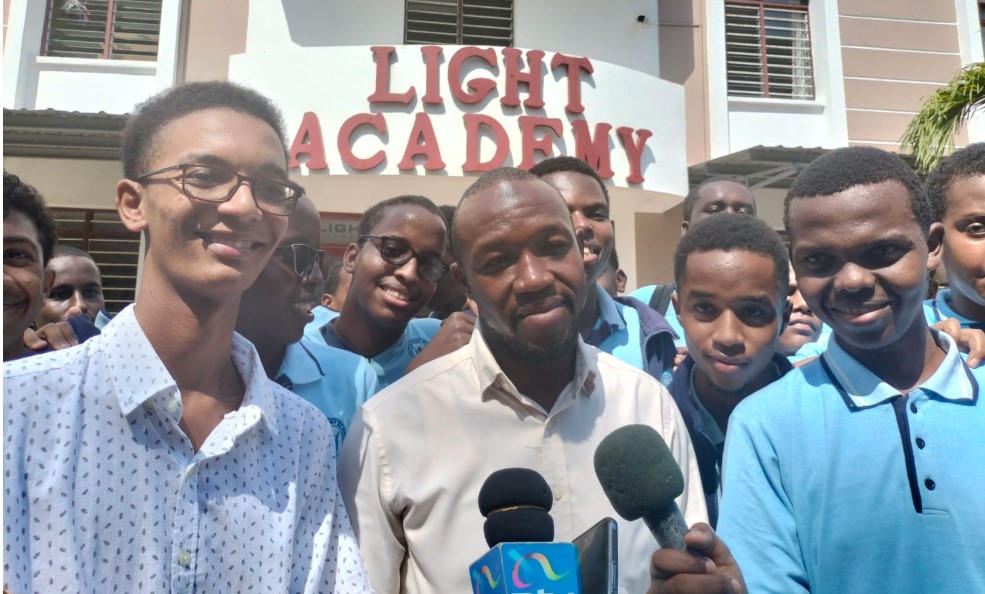 Historic shift as female candidates outnumber males for the first time in KCSE exams - Hamid Ali Muhamad (left) the top student at Light Academy in Mombasa. He scored an A of 84 points in the 2024 KCSE exam. (Photo: Farhiya Hussein) 