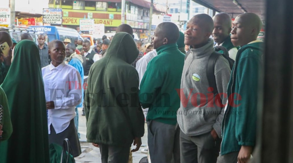 Low turnout marks day one of learning as schools reopen for 2025 first term - Students reporting back to school wait for public transport in Nairobi on January 6, 2024. (Photo: Justine Ondieki)