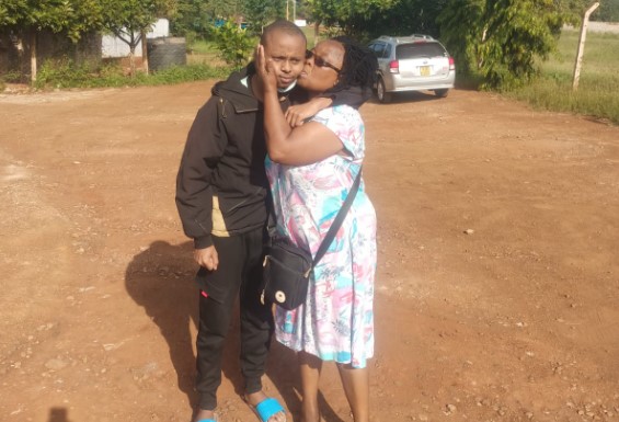 Billy Mwangi's return from captivity ends 16 days of anguish for his family - Billy Mwangi is kissed by a relative after returning home on January 6, 2025. He had been missing for 15 days after being abducted. (Photo: Family)