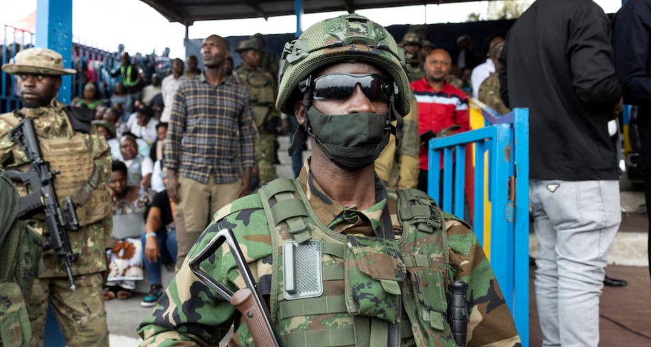 DR Congo M23 rebels say they have entered Bukavu after seizing Kavumu airport - M23 rebels stand guard during a meeting in the Democratic Republic of Congo on February 6, 2025. (Photo: REUTERS/Arlette Bashizi)