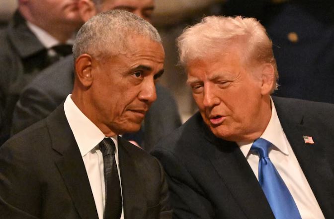 Obama slams Trump's USAID suspension as "foreign policy mistake" - Former President Barack Obama speaks with President Donald Trump before the State Funeral Service for former President Jimmy Carter at the Washington National Cathedral in Washington, Jan. 9, 2025.
(Photo: Roberto Schmidt/AFP via Getty Images)