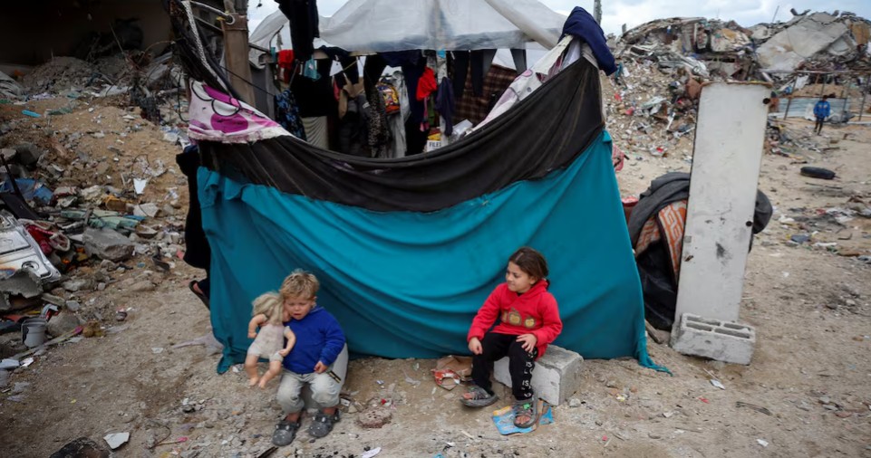 Hamas says willing to move ahead with Gaza ceasefire despite ‘language of threats and intimidation’ - Palestinian children play near the rubble of their destroyed house in Jabalia refugee camp in the northern Gaza Strip on February 13, 2025, amid a ceasefire between Israel and Hamas. (Photo: REUTERS/Mahmoud Issa)