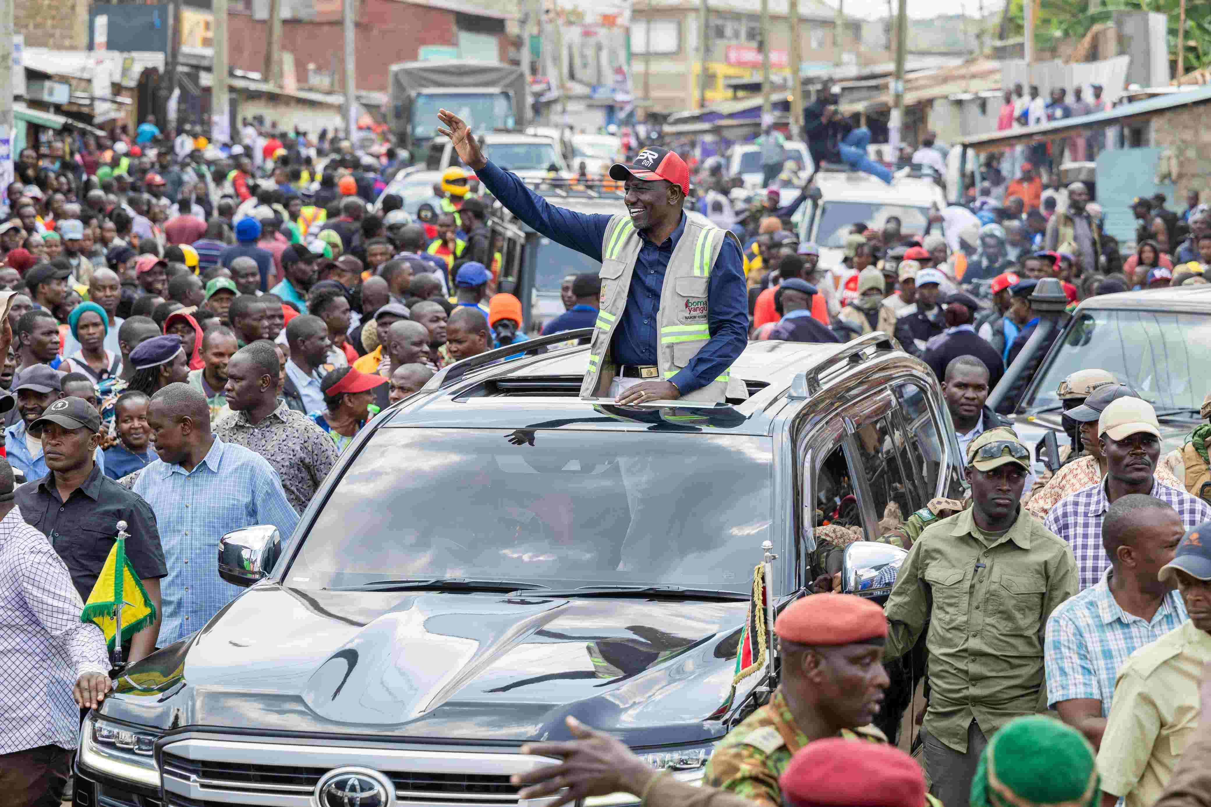 All Kenyans to receive ID cards free of charge as Ruto scraps Sh1,000 fee - President William Ruto acknowledges greetings from locals during his tour of Lang'ata and Kibra constituencies on March 13, 2025. (Photo: PCS)