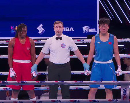 Elizabeth Andiego’s controversial exit ends Kenya’s dismal World Boxing run - Kenyan boxer Elizabeth Andiego (red) stands with Estonian referee Moris Puhno and Chinese opponent Wang Xiaomeng after their lightweight quarterfinal bout at the 2025 IBA Women's World Boxing Championships in Nis, Serbia, on March 13, 2025.