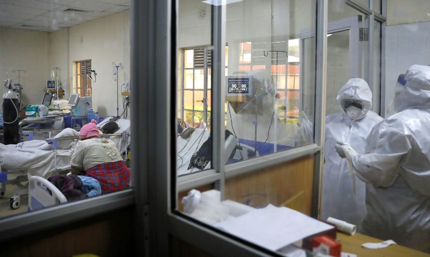 Five years since Kenya’s first Covid-19 case: Lessons, progress and preparedness - Medical staff dressed in protective suits talk to each other as they treat coronavirus disease patients at the COVID-19 ICU of Machakos Level 5 Hospital, in Machakos, Kenya October 28, 2020. (Photo: REUTERS/Baz Ratner)