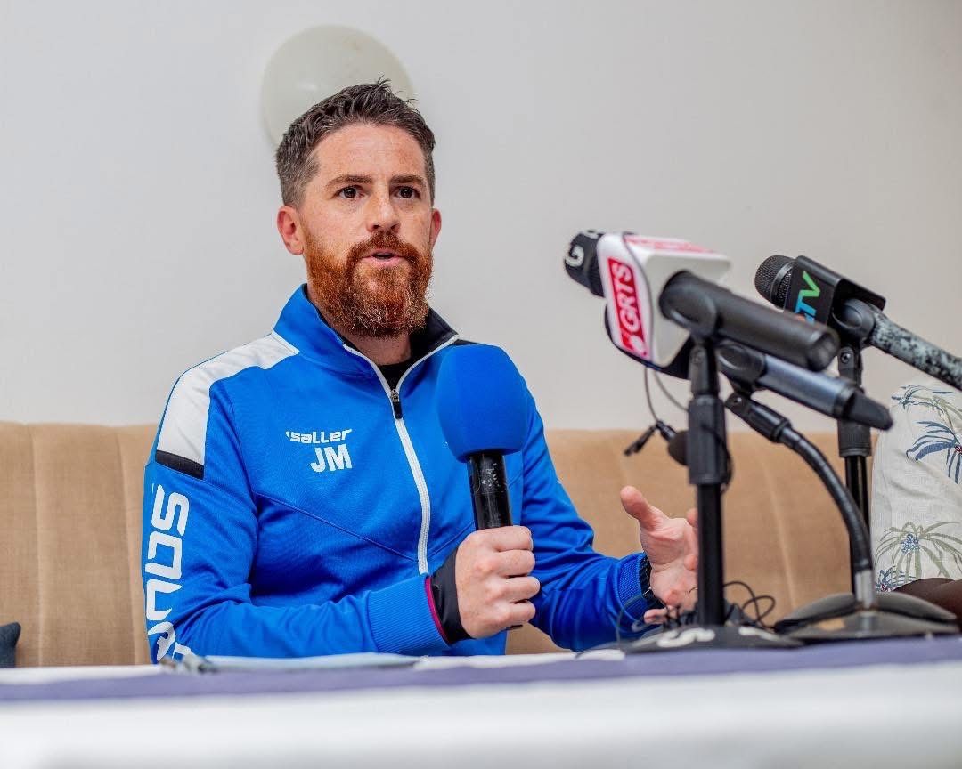 McKinstry's Kenyan reunion presents clash of similar styles ahead of Gambia's encounter against Harambee Stars - Gambian national football team coach Johnathan McKinstry speaking during a past press conference.