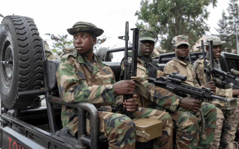 Angola attempting to mediate direct talks between M23 rebels and DRC government - M23 rebels sit on a truck during the escort of captured FDLR members (not pictured) to Rwanda for repatriation, at the Goma-Gisenyi Grande Barrier border crossing, March 1, 2025. REUTERS