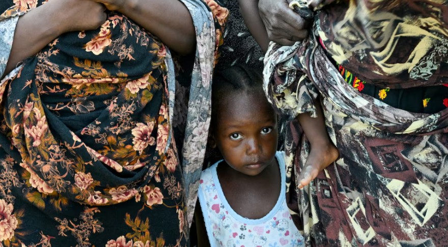 [IGNORE]UNICEF says 16 million children in Sudan at risk of starvation as war devastates nation - A child stands between two women at a school turned into a shelter, in Port Sudan, Sudan. (Photo: File/REUTERS/Abrahim Mohammed Ishac)