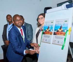 Kenyan farmers to benefit from Sh35.5 million project to reduce pesticide use and boost exports - Dr. Joseph Mulema, Senior Scientist, Research, based at CABI’s regional centre for Africa in Nairobi, signs to mark the project launch. Looking on is Dr. Elena Benedetti, Head, Fundraising and Technology Transfer at ICGEB and Twiga Chemicals Technical Manager in charge of crop protection, Edward Kitui. (KNA)