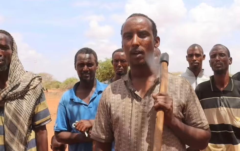 Wajir residents call for livestock restocking after quitting charcoal trade - Ahmed Abdisan, a charcoal burner, who abandoned the trade speaks before surrendering his axe. (Issa Hussein)
