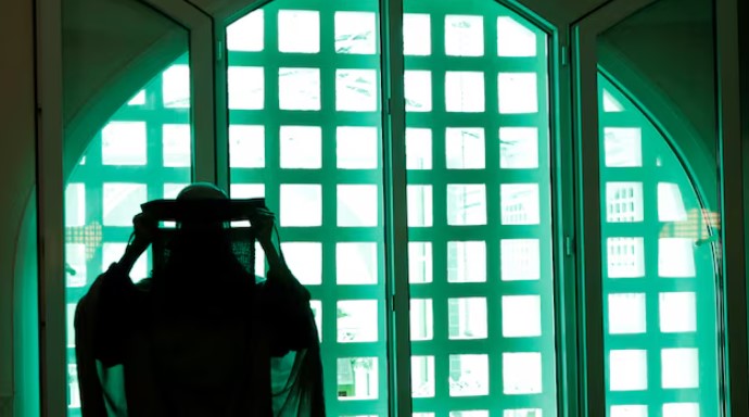 UN chief Antonio Guterres says there is 'disturbing rise in anti-Muslim bigotry' - A Muslim woman prepares to attend the Friday prayers during the holy fasting month of Ramadan at the Jamia Mosque in downtown Nairobi, Kenya March 14, 2025. (Photo.REUTERS)