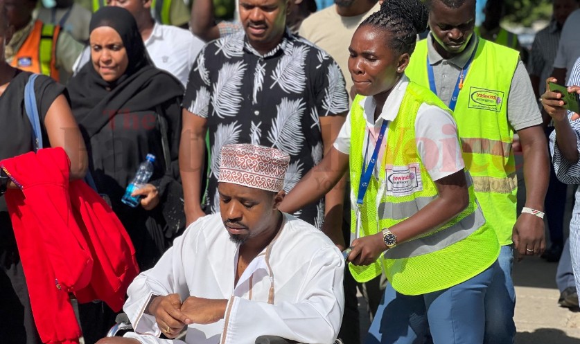 Tortured activist Boniface Mwangi flown to Nairobi for treatment after release from Tanzania