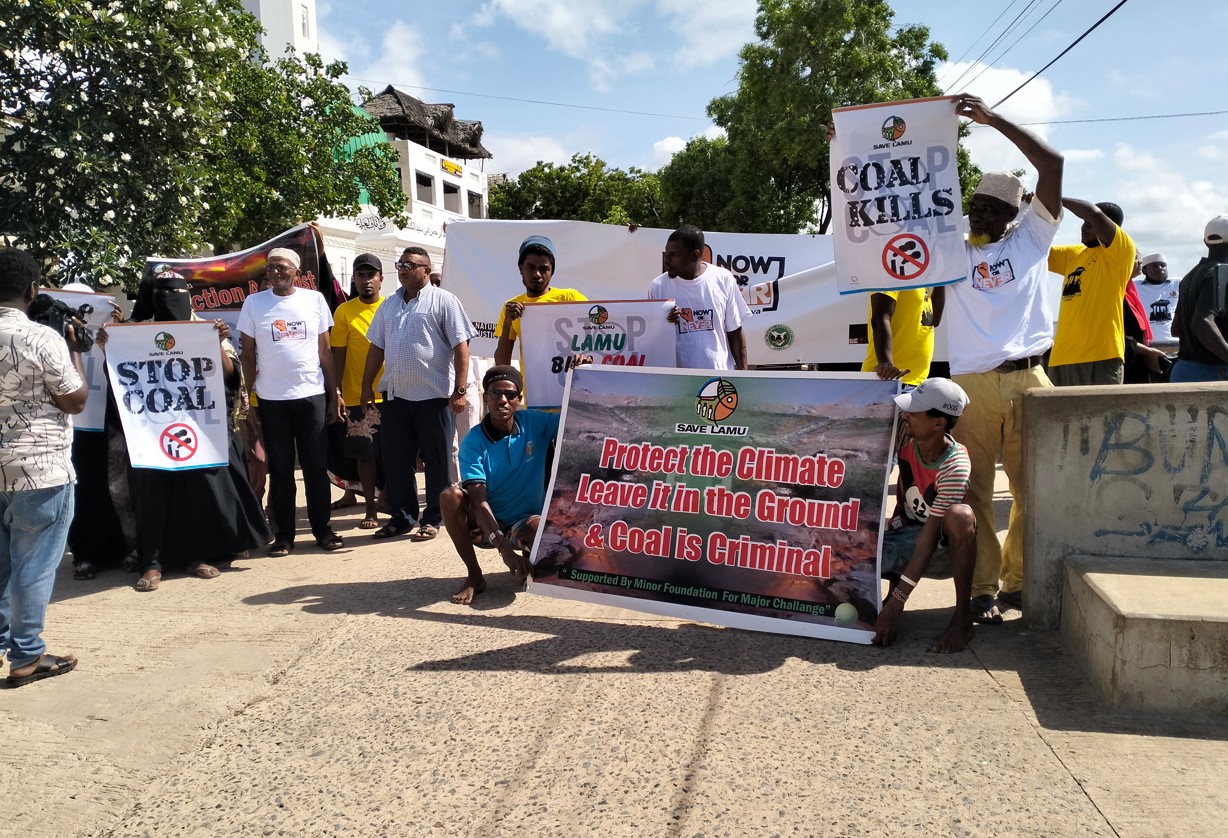 Environmental activists march against coal project, advocate for safe power