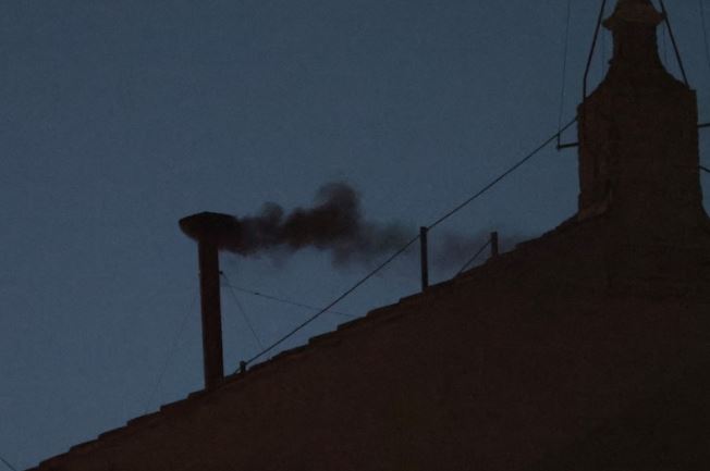 Black smoke signals no pope elected at first vote, next round of voting on Thursday - Black smoke rises from the chimney on the Sistine Chapel, at the Vatican, May 7, 2025. (Photo: REUTERS/Hannah McKay)