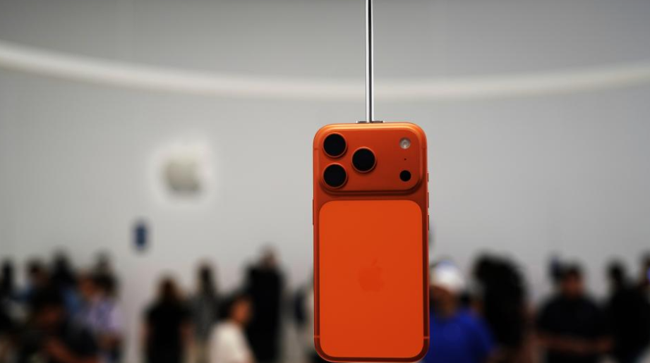 Apple unveils new iPhones, wireless earphone products