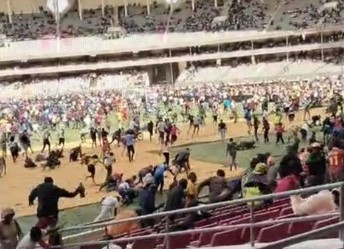 Police lob teargas to disperse surging crowds at Kasarani Stadium