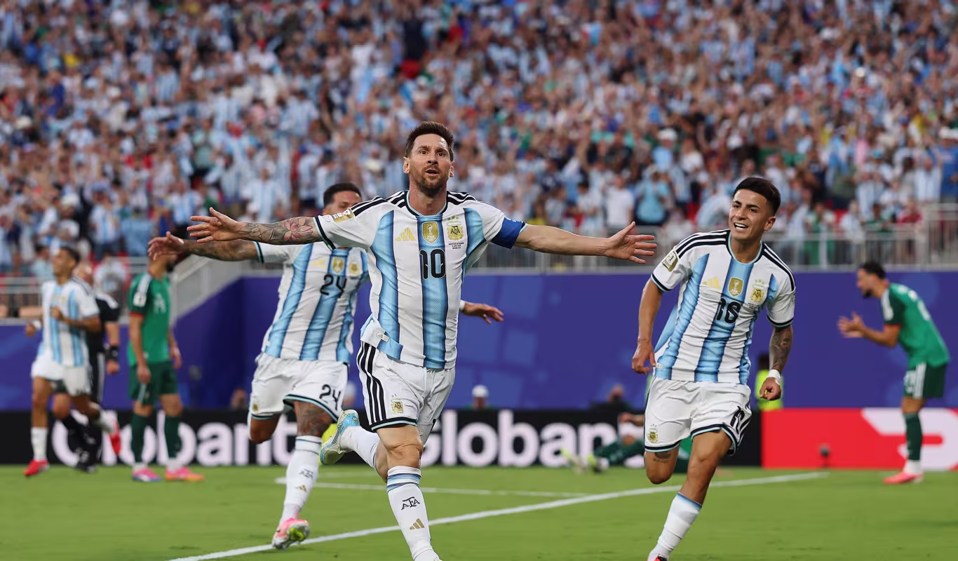 Messi hat-trick leads Argentina to comfortable win over Algeria