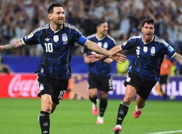 Messi makes World Cup history as Argentina complete perfect group stage while Algeria survive dramatic finale to seal knockout spot